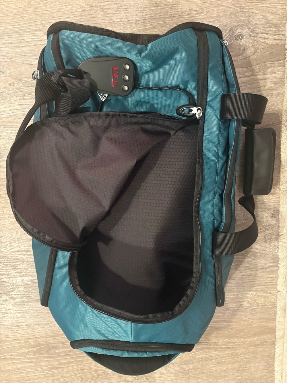 Tumi Teal Travel Duffel / backpack 
Very roomy to store things in very sturdy - Picture 8 of 13